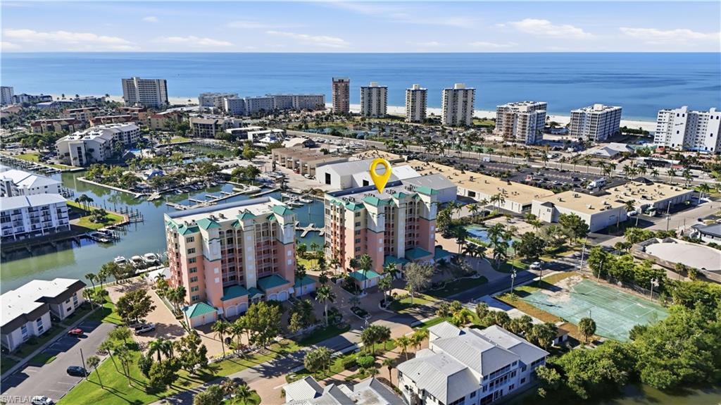 150 Lenell Road, Unit 503 Fort Myers Beach, FL 33931 - Photo 2 of 32 a city view with tall buildings