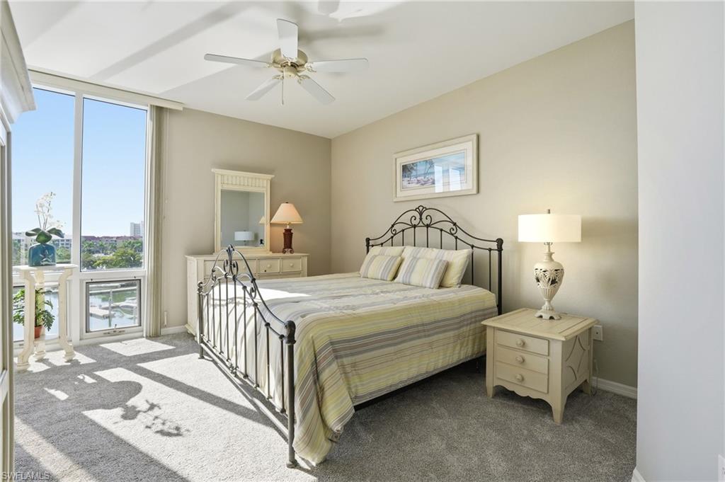 150 Lenell Road, Unit 503 Fort Myers Beach, FL 33931 - Photo 21 of 32 a bedroom with a bed and a window