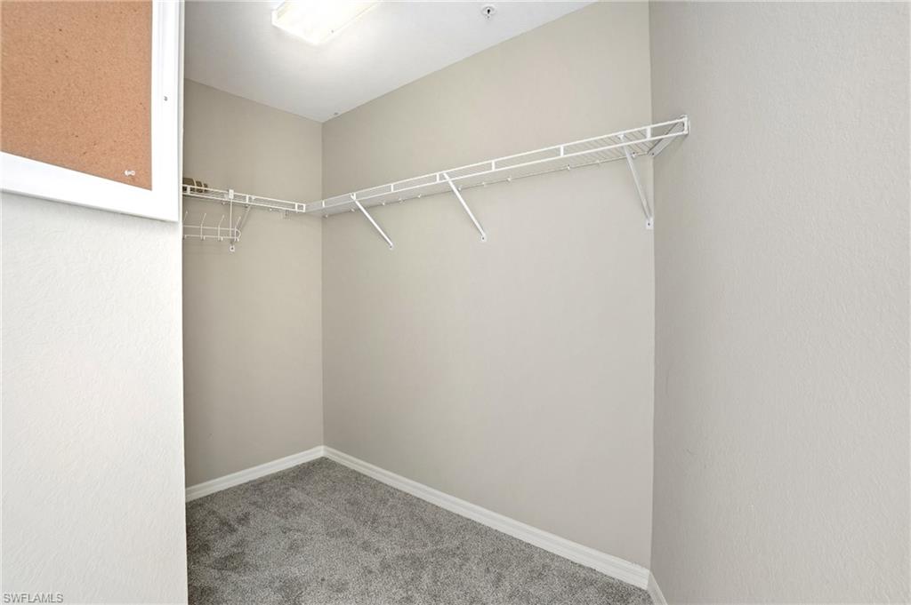 150 Lenell Road, Unit 503 Fort Myers Beach, FL 33931 - Photo 27 of 32 a view of an empty walk in closet