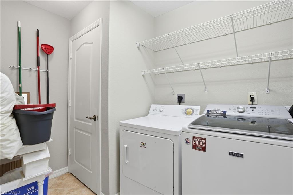 150 Lenell Road, Unit 503 Fort Myers Beach, FL 33931 - Photo 32 of 32 a utility room with dryer and washer