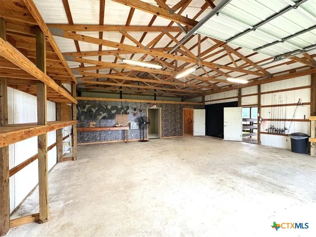 a view of a room with racks on the wall