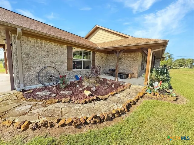a front view of a house with patio