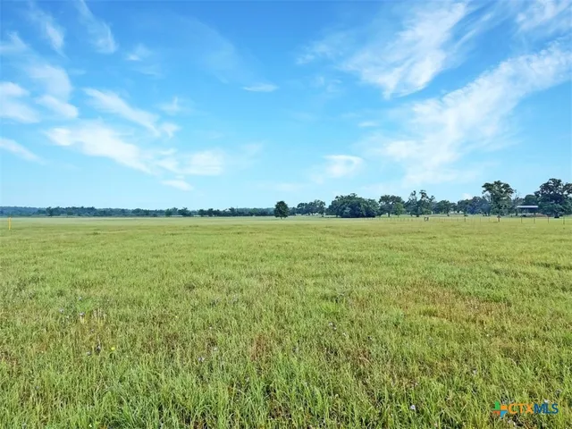 a view of an ocean from a yard