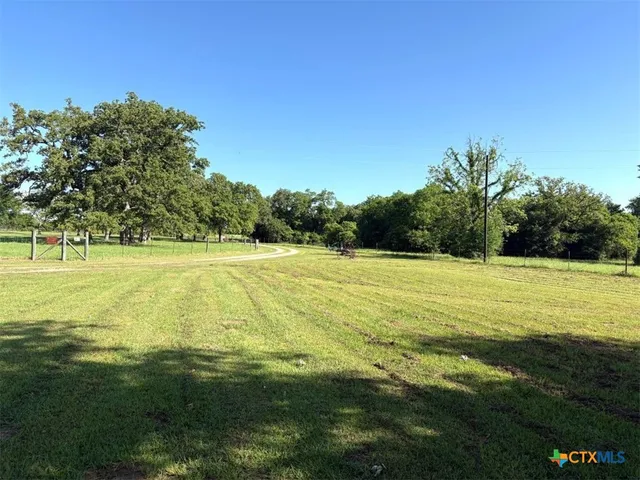 a view of an ocean from a yard
