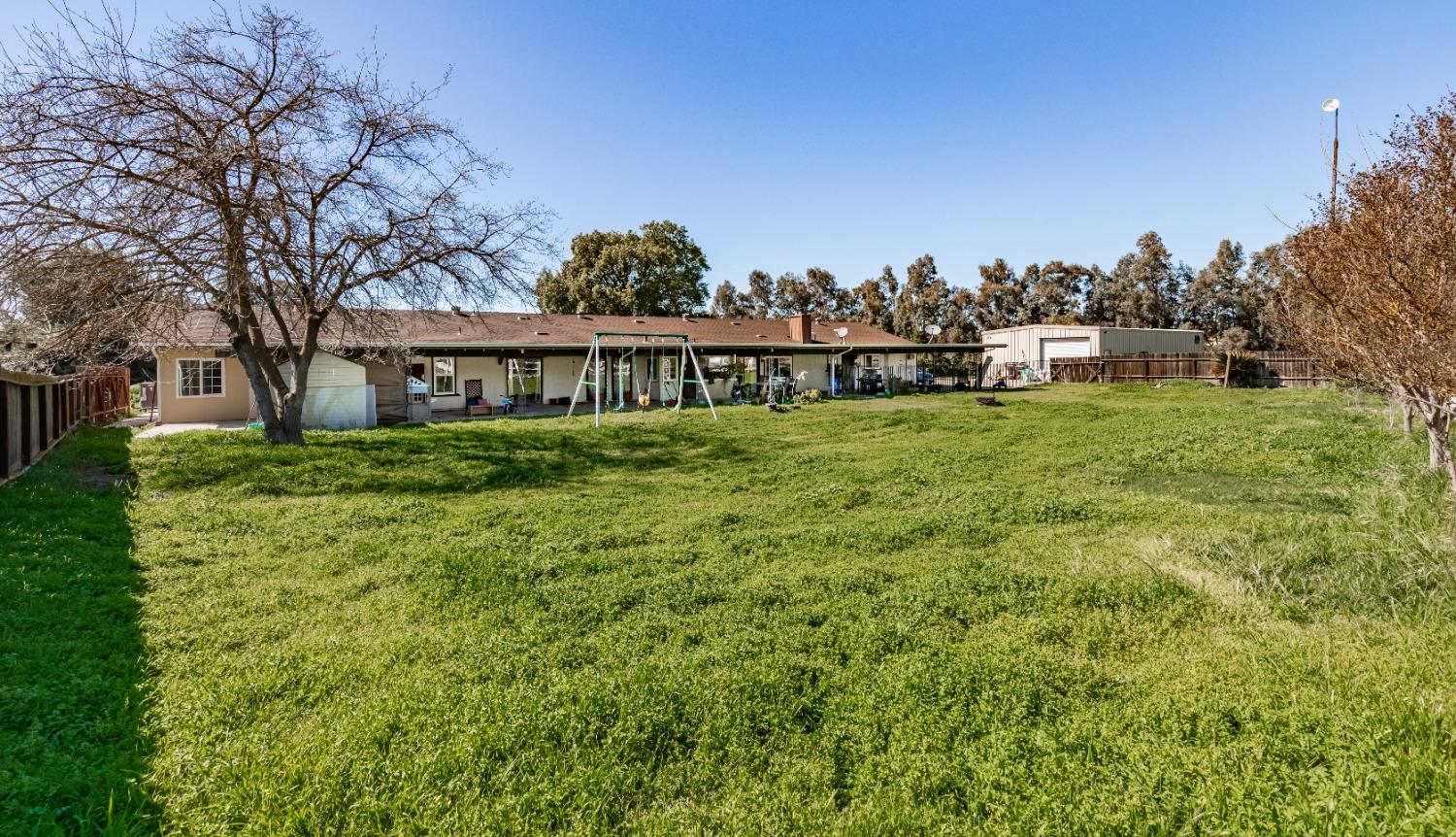 16993 Jennifer Court Madera, CA 93636 - Photo 36 of 55 a view of a garden with houses