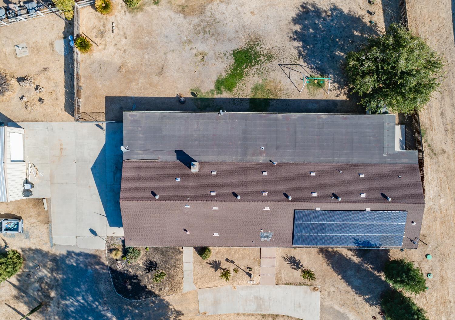 16993 Jennifer Court Madera, CA 93636 - Photo 52 of 55 an aerial view of a house with a yard