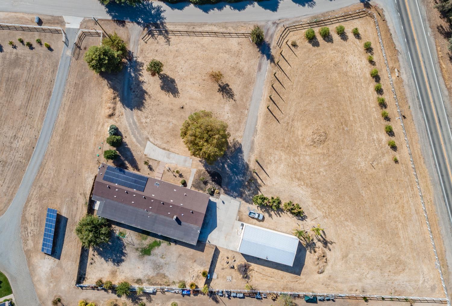 16993 Jennifer Court Madera, CA 93636 - Photo 55 of 55 an aerial view of a house