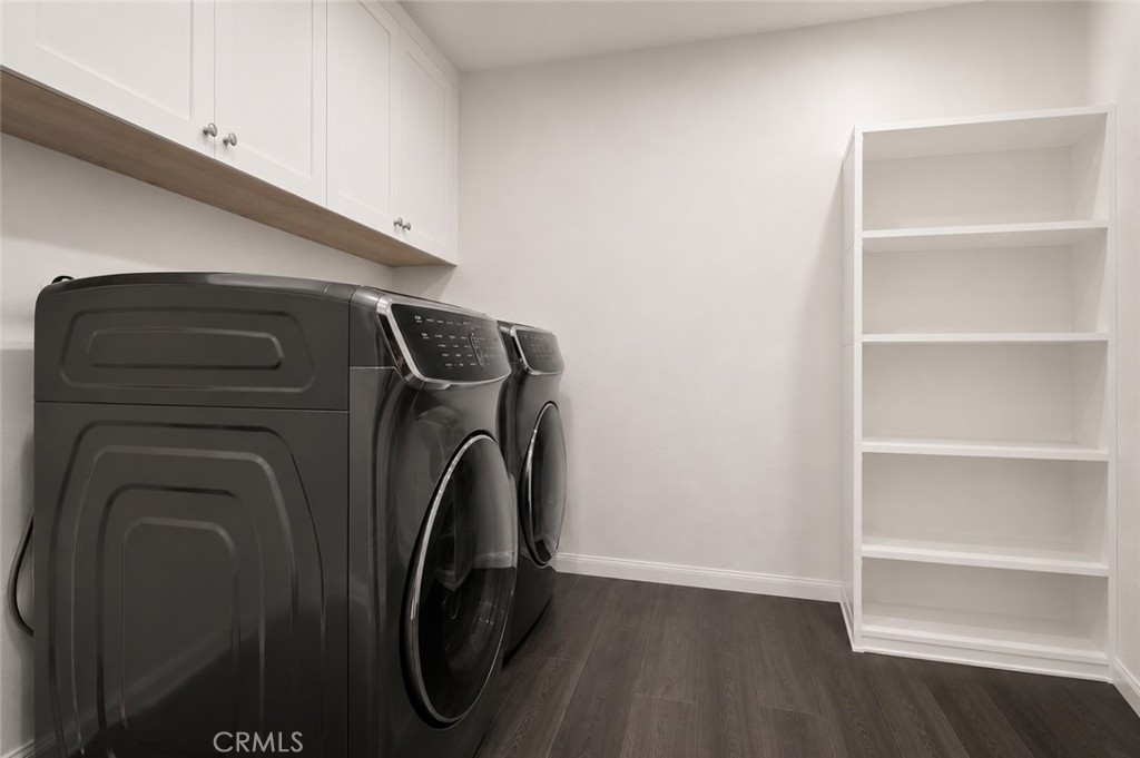 11056 Guffey Ranch Way Corona, CA 92883 - Photo 32 of 61 a utility room with dryer and washer