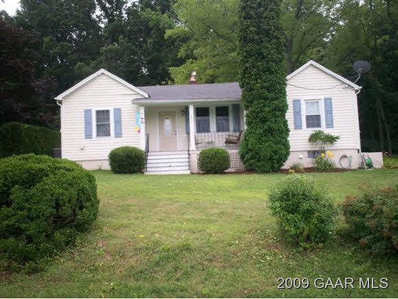 262 Cider Mill Road Mount Sidney, VA 24467 - Photo 1 of 9 a front view of a house with a yard and garage