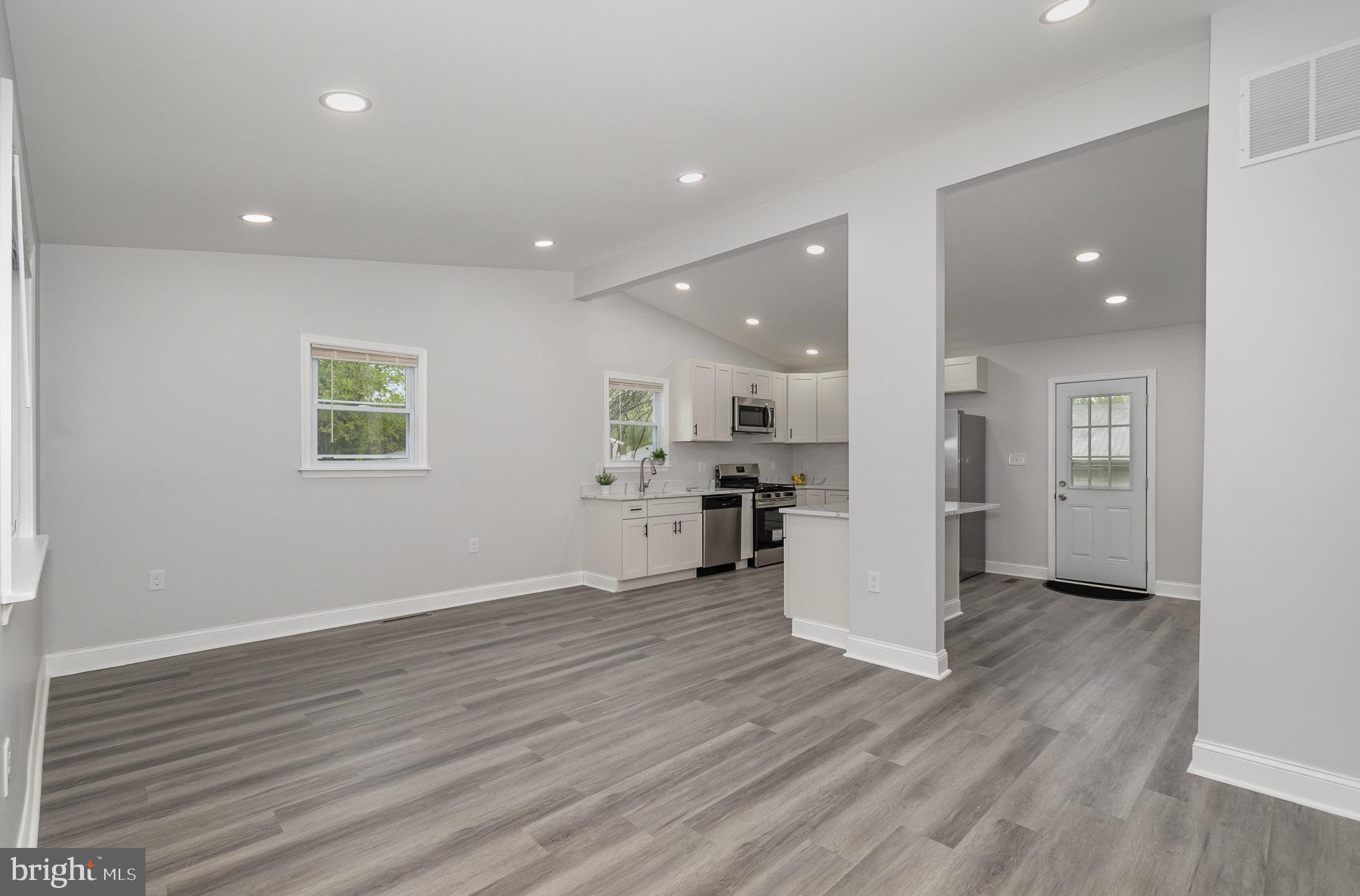 8409 Charlton Road Randallstown, MD 21133 - Photo 7 of 28 Living Rm to Kitchen/Dining Area