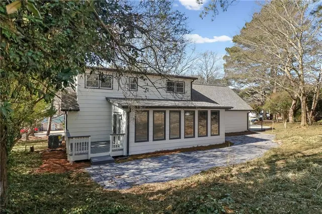 front view of a house with a yard