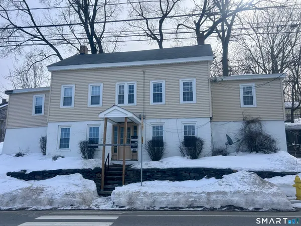 a front view of a house with entertaining space