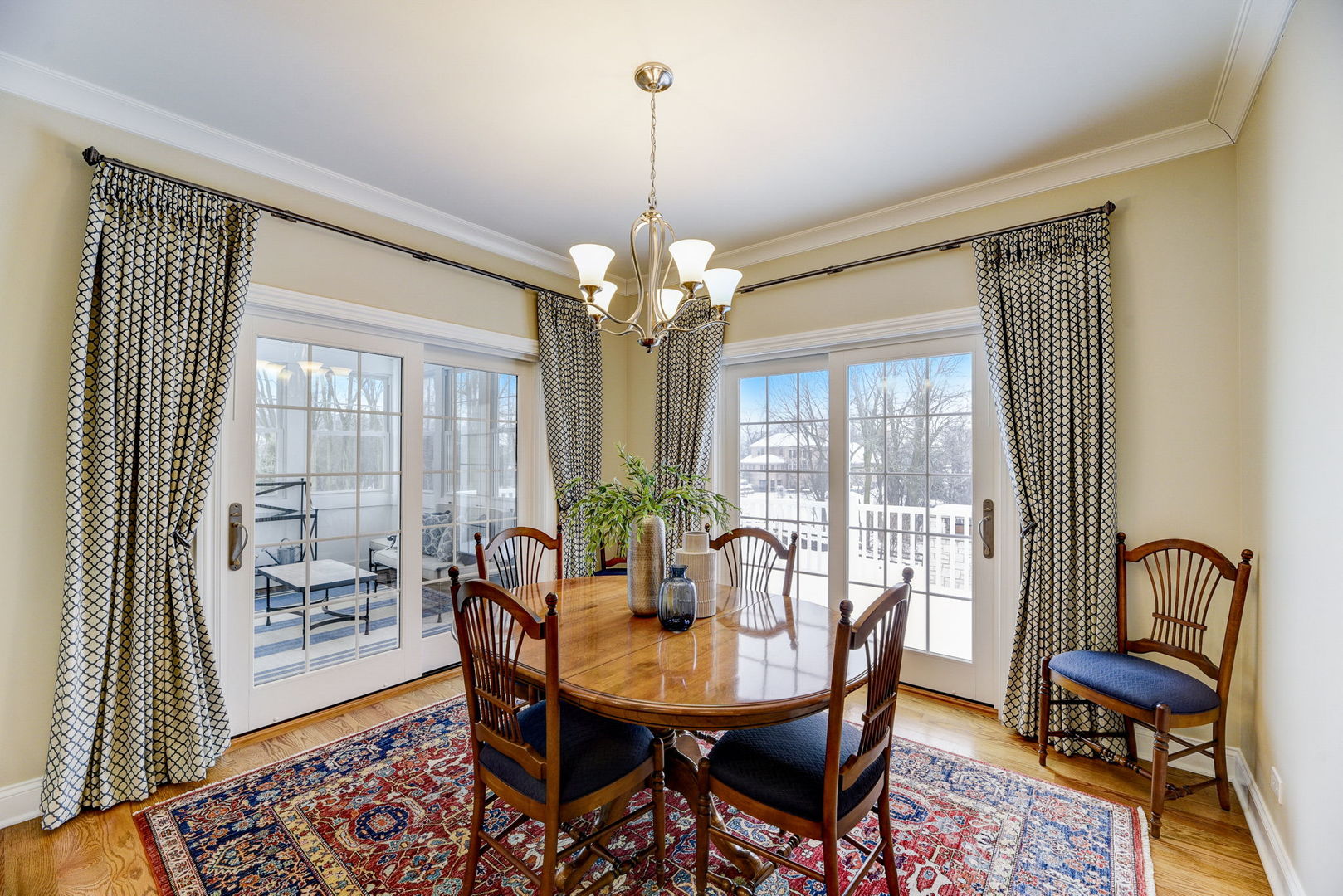 20940 West Summit Drive Kildeer, IL 60047 - Photo 15 of 62 a view of a dining room with furniture wooden floor and a chandelier