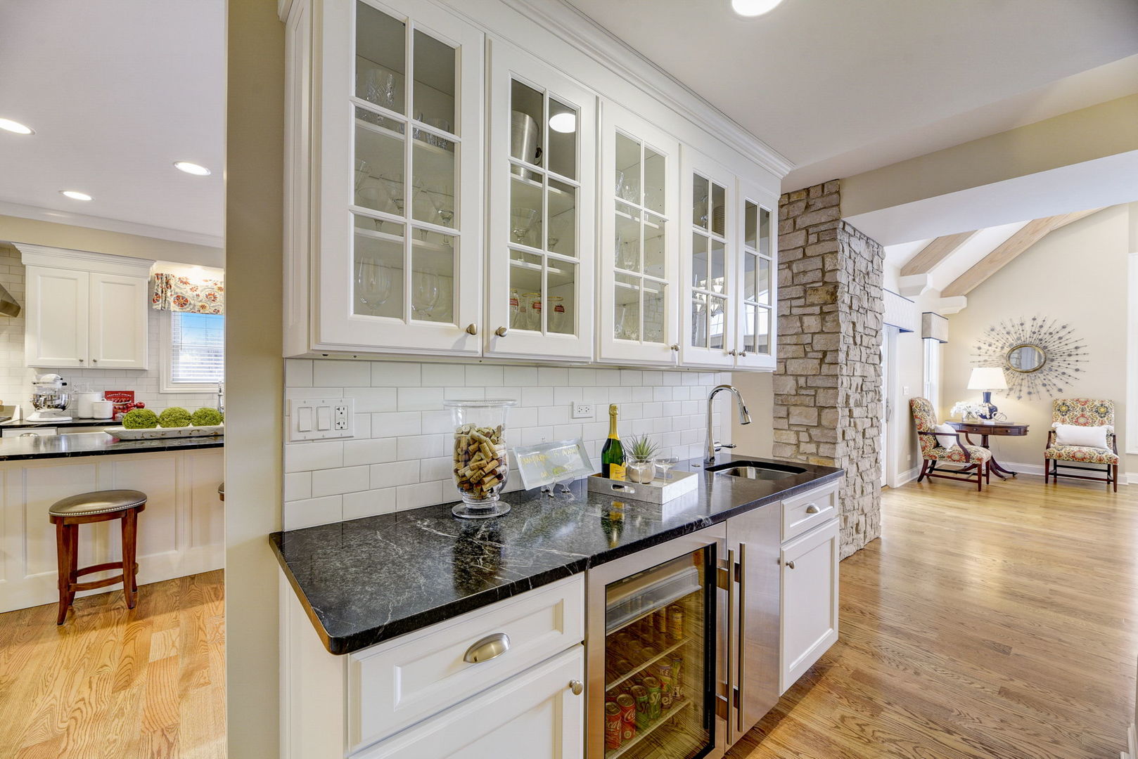 20940 West Summit Drive Kildeer, IL 60047 - Photo 17 of 62 a kitchen with stainless steel appliances granite countertop a stove a sink and a granite counter tops with wooden floors