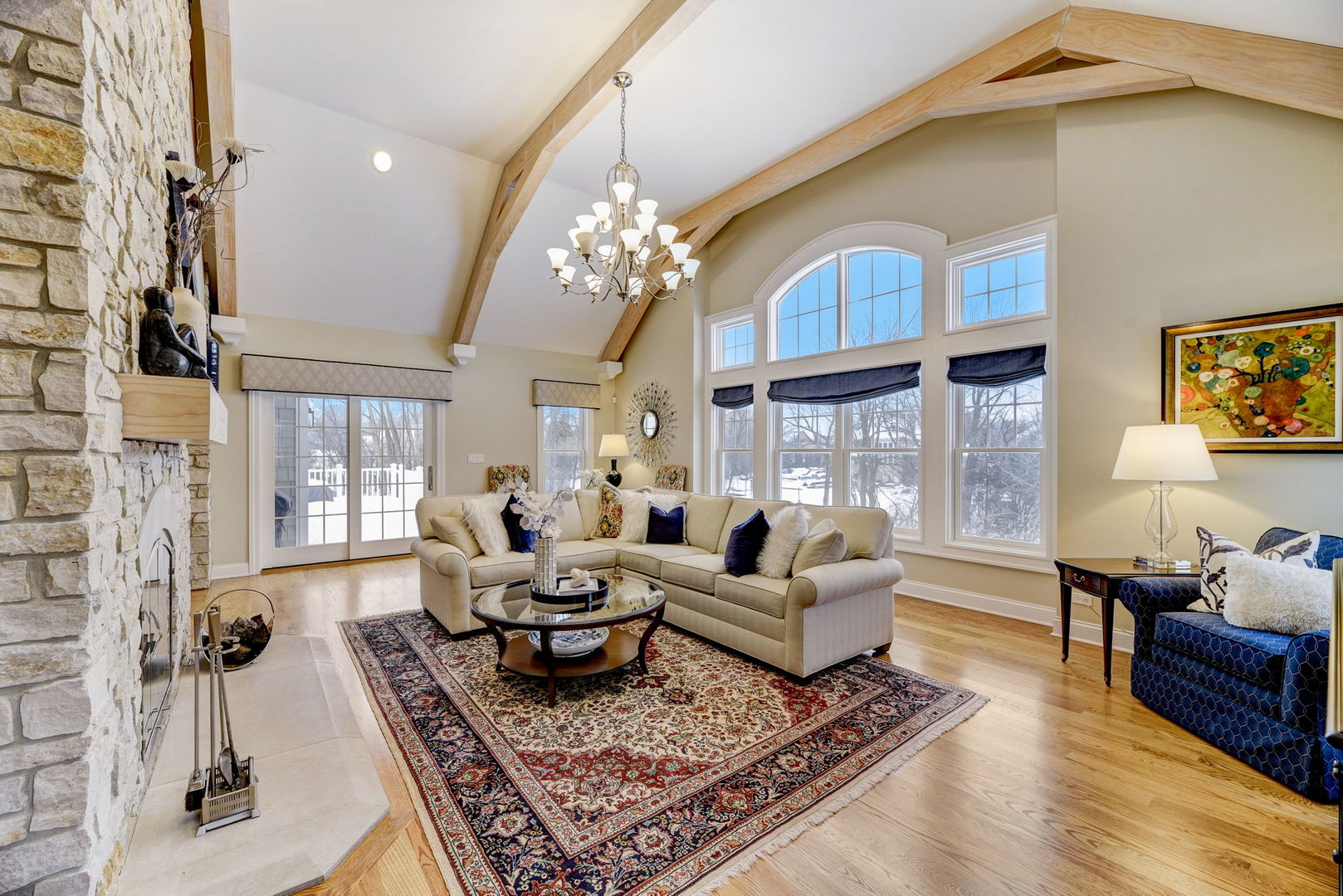 20940 West Summit Drive Kildeer, IL 60047 - Photo 18 of 62 a living room with furniture a chandelier and a rug