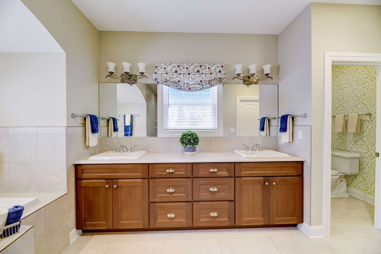 20940 West Summit Drive Kildeer, IL 60047 - Photo 25 of 62 a bathroom with a granite countertop sink and a mirror