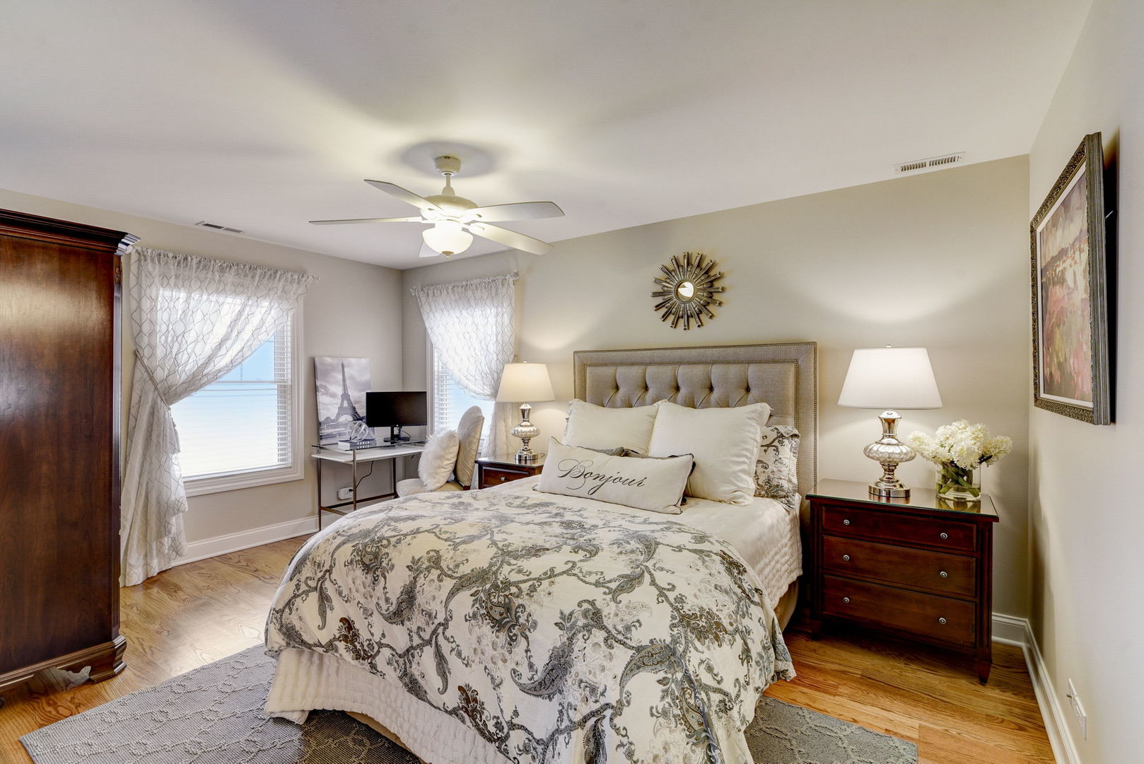 20940 West Summit Drive Kildeer, IL 60047 - Photo 32 of 62 a bedroom with a bed and a chandelier