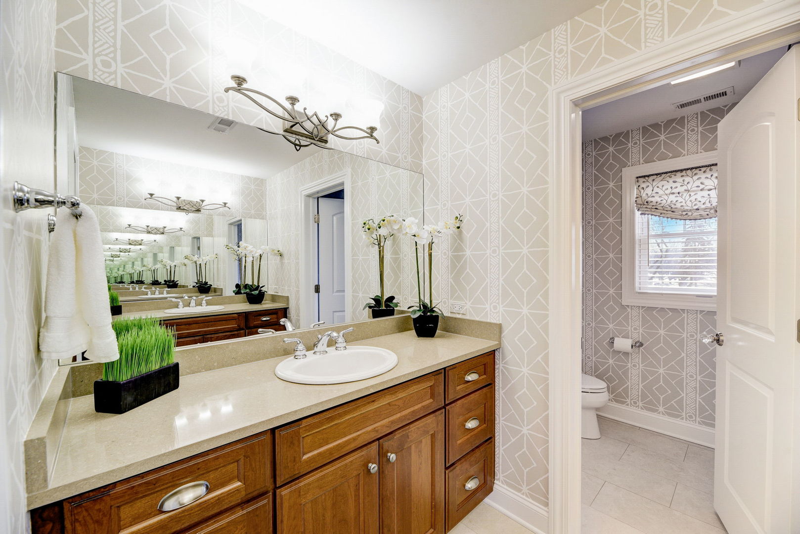 20940 West Summit Drive Kildeer, IL 60047 - Photo 36 of 62 a bathroom with a sink a vanity and a mirror