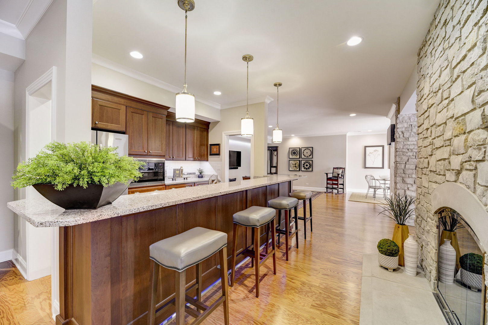 20940 West Summit Drive Kildeer, IL 60047 - Photo 39 of 62 a kitchen with counter and chairs