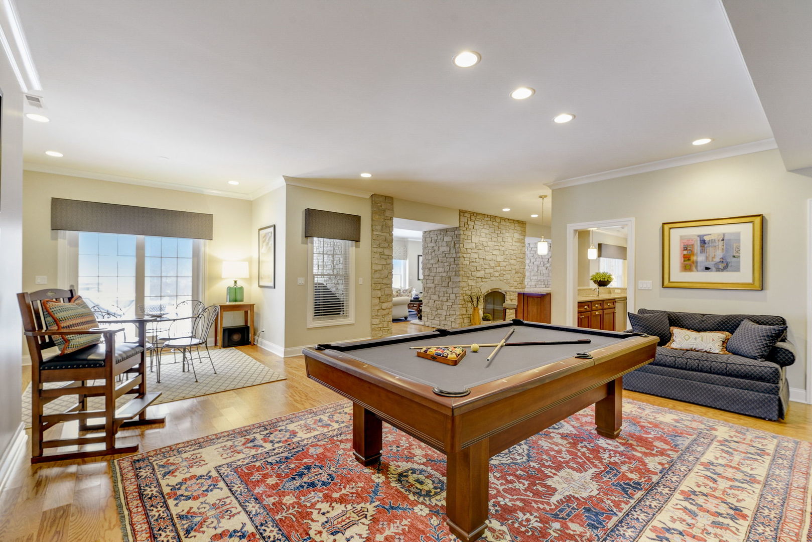 20940 West Summit Drive Kildeer, IL 60047 - Photo 44 of 62 a living room with furniture pool table and a table