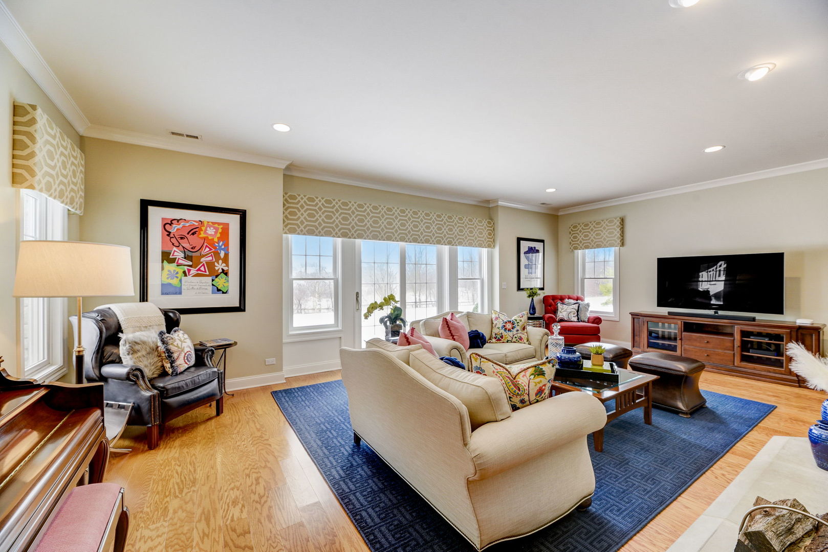20940 West Summit Drive Kildeer, IL 60047 - Photo 47 of 62 a living room with furniture and a flat screen tv