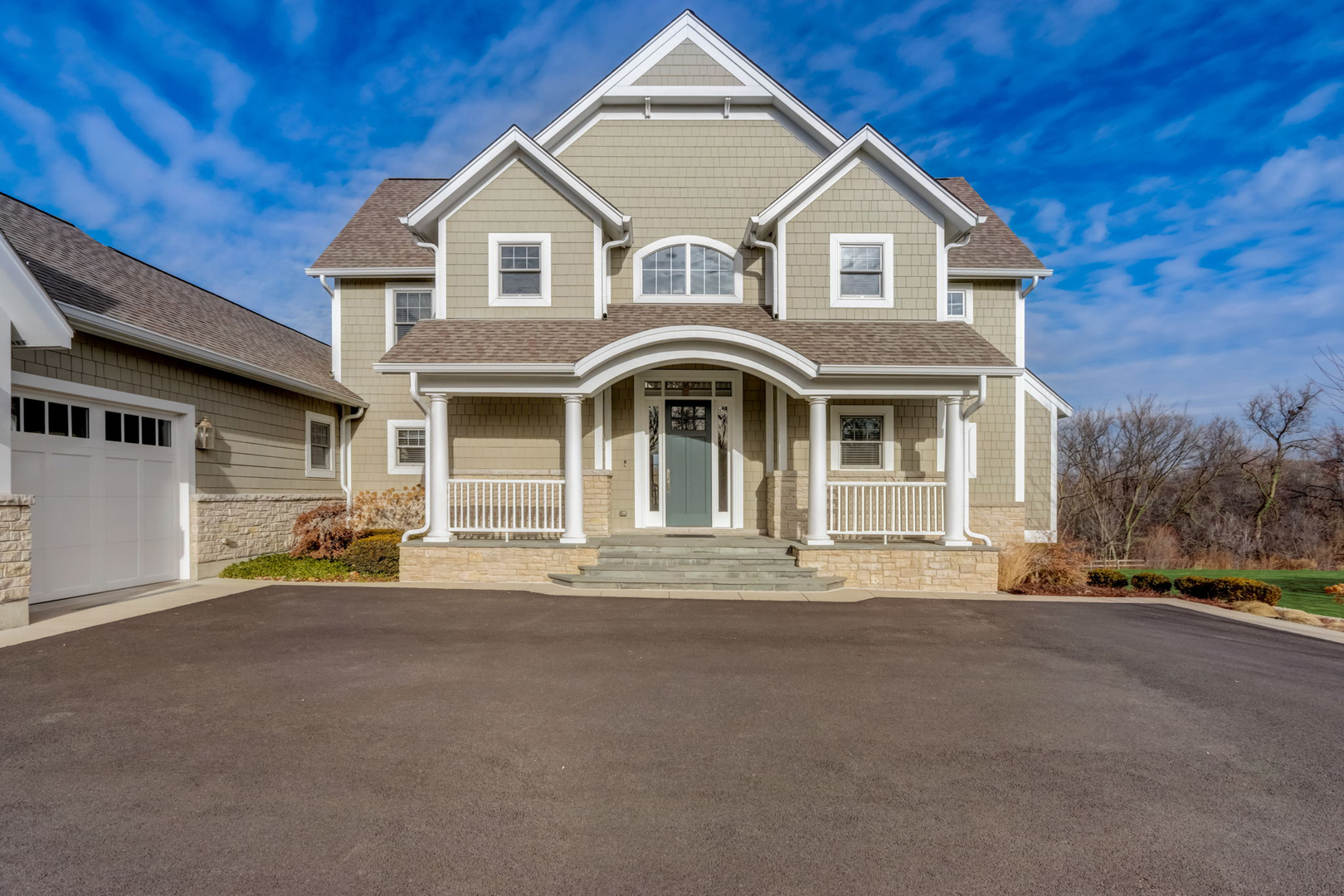 20940 West Summit Drive Kildeer, IL 60047 - Photo 5 of 62 a front view of a house with a yard