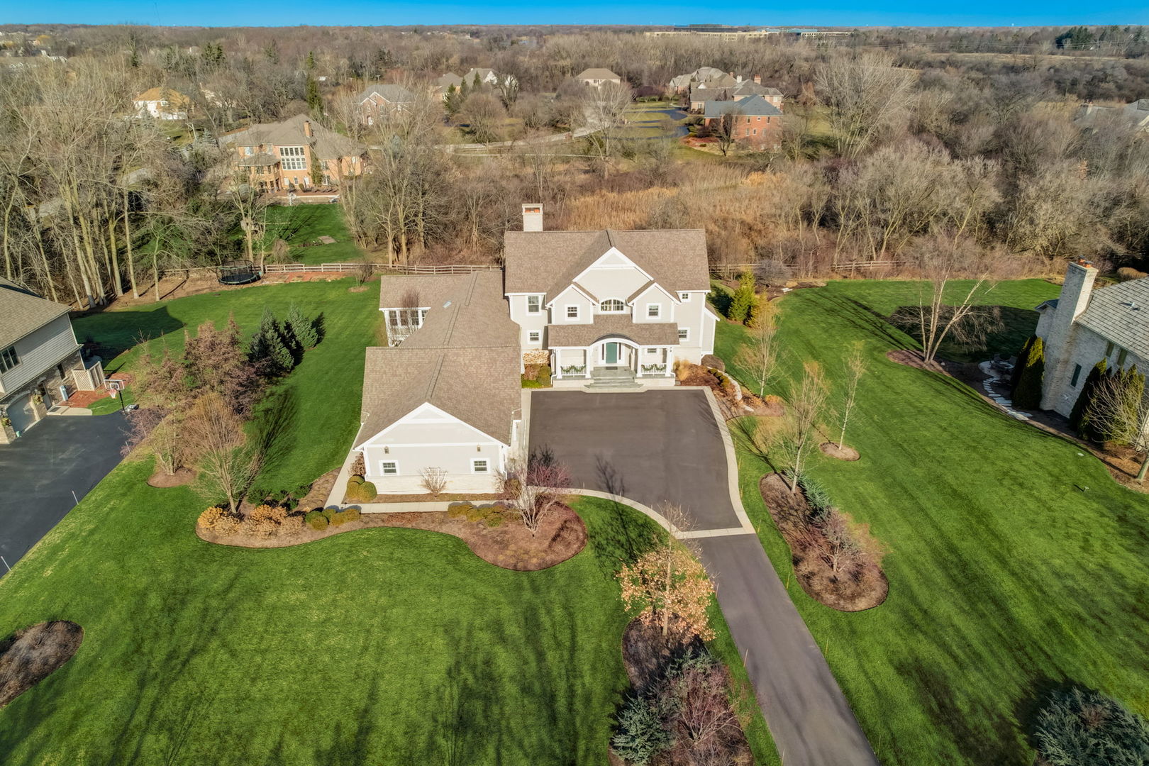 20940 West Summit Drive Kildeer, IL 60047 - Photo 61 of 62 a view of a garden with a building in the background