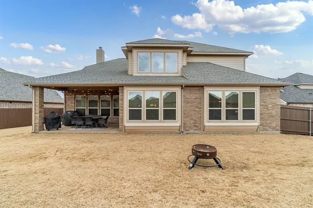 a front view of a house with a patio