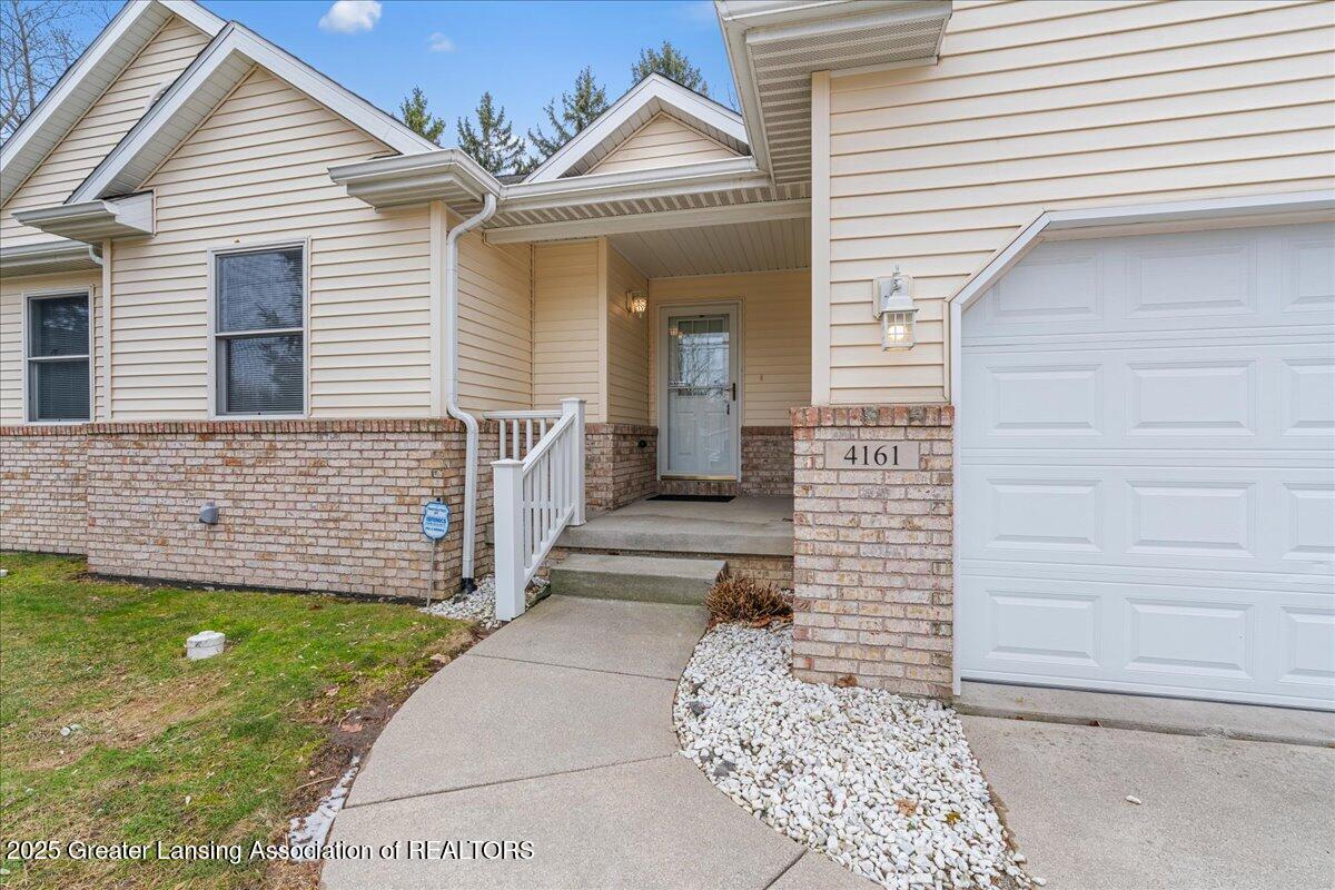 4161 Holt Road Holt, MI 48842 - Photo 3 of 25 Front Porch