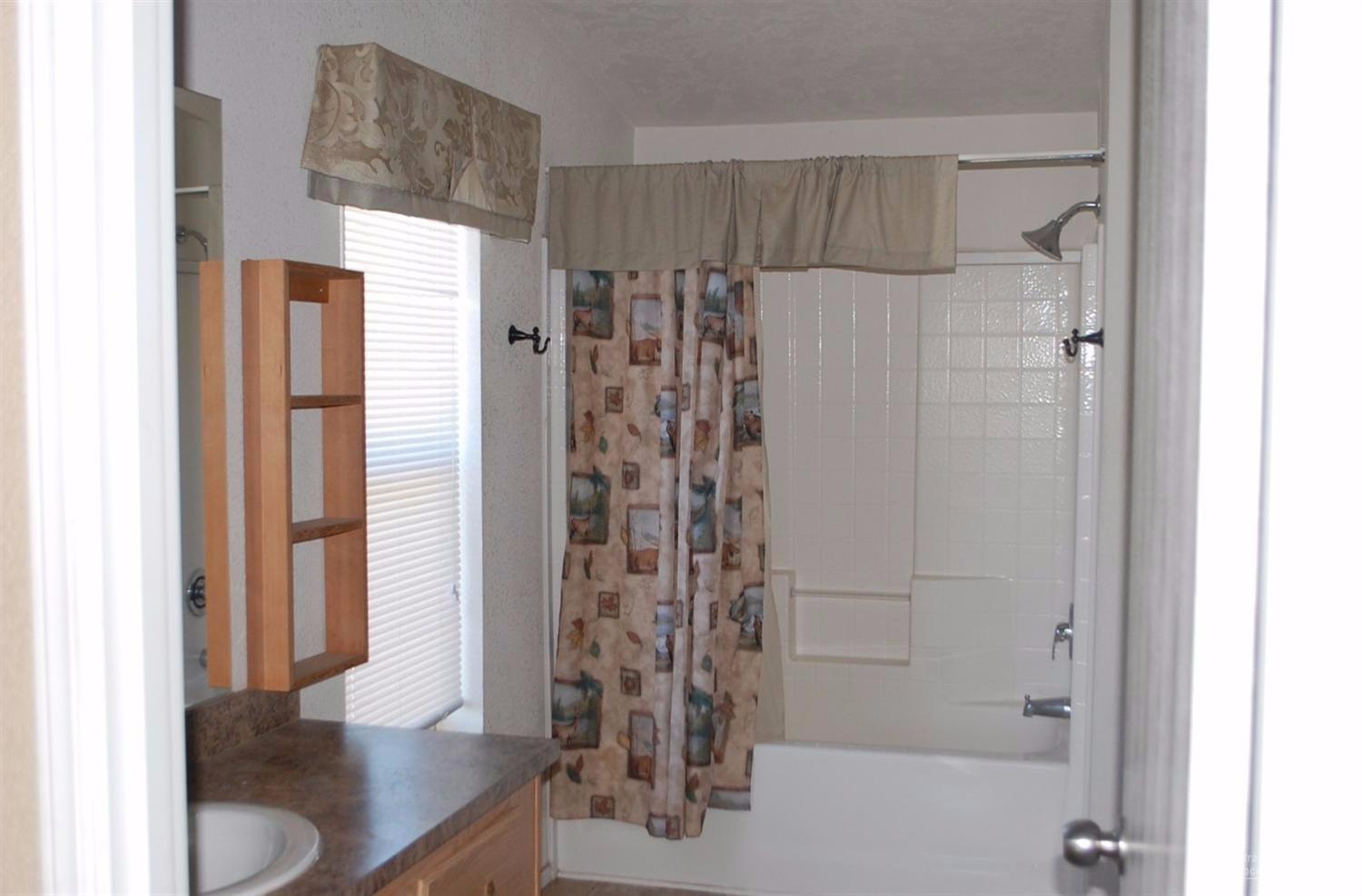 62255 Cody Road Bend, OR 97701 - Photo 8 of 11 Master bathroom Shower/Tub.
