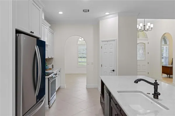 a bathroom with double vanity sink and a mirror