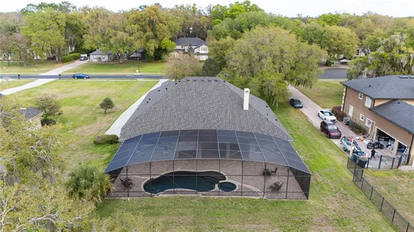a aerial view of a house with a yard