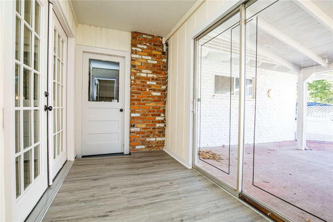1101 Cheyenne Trail Springdale, AR 72762 - Photo 10 of 18 Breezeway leads to the garage, kitchen and dining areas.