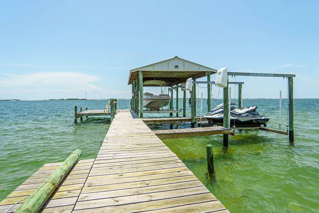 a hallway with washer and dryer