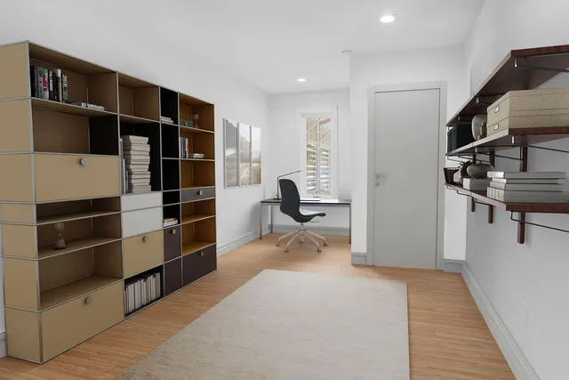 a kitchen with a sink a cabinets and stainless steel appliances