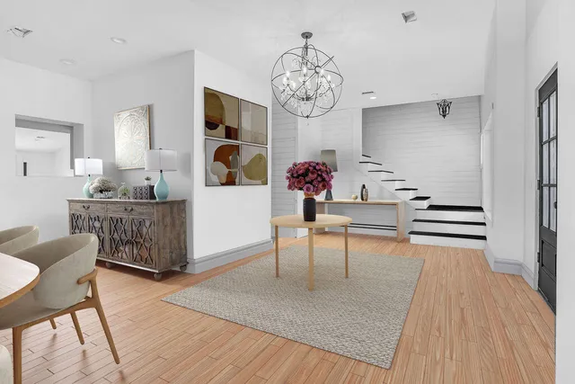 a bathroom with a double vanity sink mirror and shower