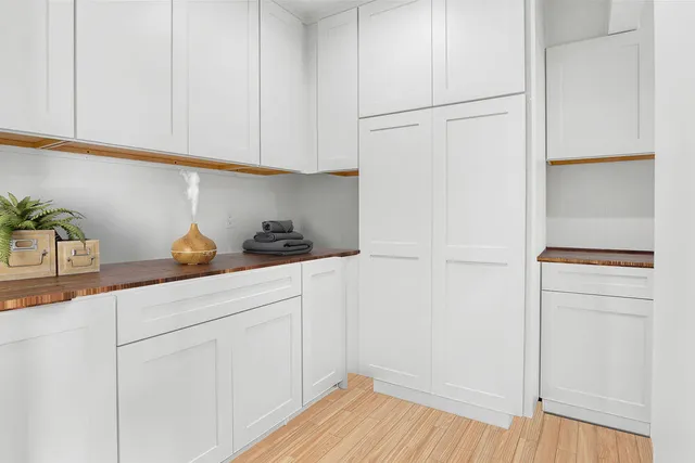 a utility room with washer and dryer