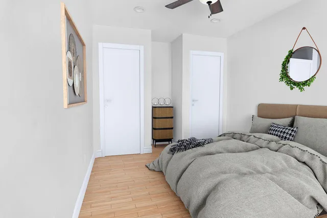 a bathroom with a tub and a view of bathroom