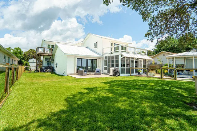 a view of a lake with a big yard