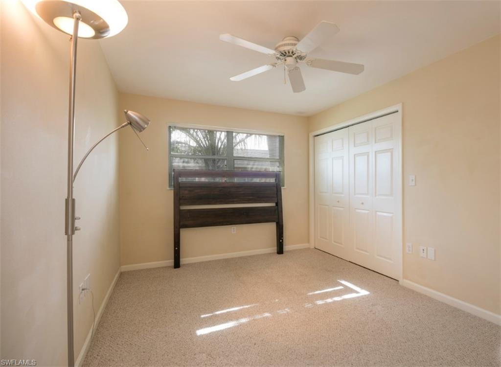 524 97th Avenue North, Unit B Naples, FL 34108 - Photo 3 of 13 a view of empty room with windows