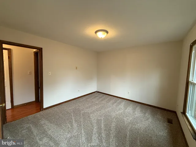 an empty room with a natural light