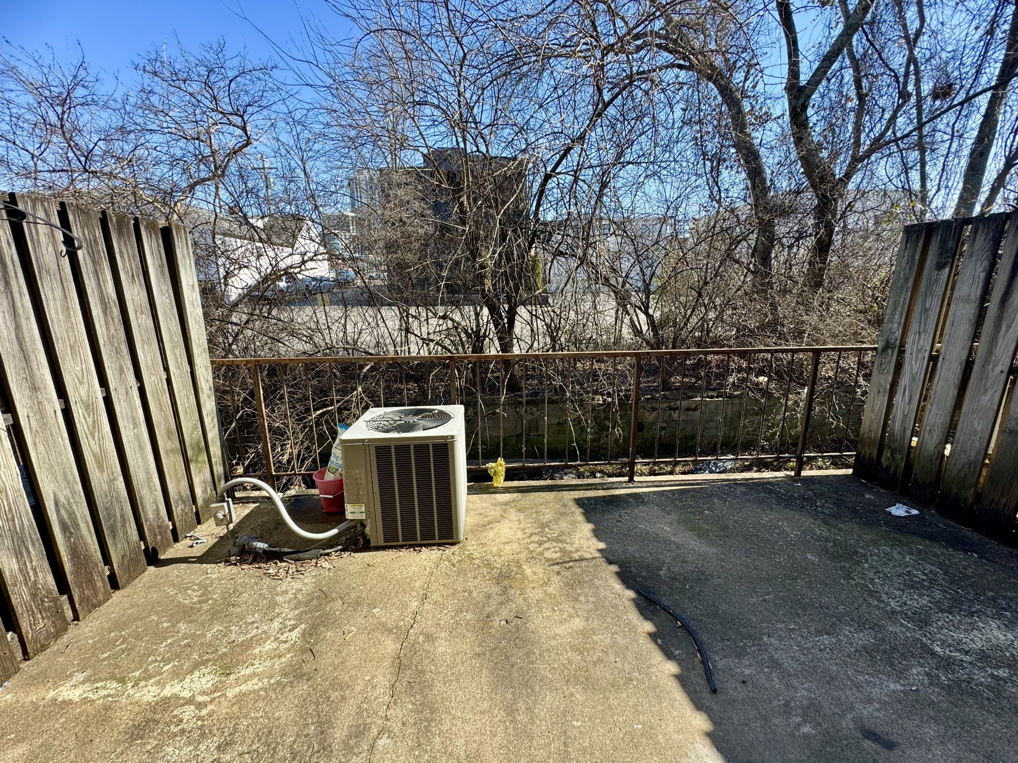 2116 Hobbs Road, Unit J9 Nashville, TN 37215 - Photo 12 of 17 a view of a backyard with wooden fence