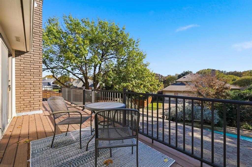 7608 Tallow Road Irving, TX 75063 - Photo 24 of 40 a view of a chairs and table in the balcony