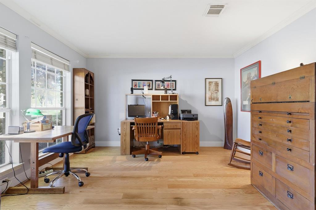 7608 Tallow Road Irving, TX 75063 - Photo 5 of 40 a view of a workspace with furniture and a window