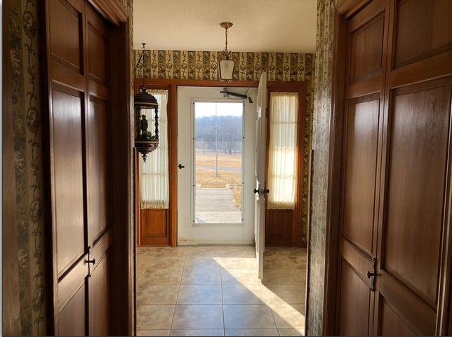 990 West Pines Road Oregon, IL 61061 - Photo 2 of 24 a bathroom with a glass shower door and mirror