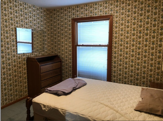 990 West Pines Road Oregon, IL 61061 - Photo 12 of 24 a bedroom with a bed and a window