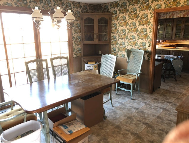 990 West Pines Road Oregon, IL 61061 - Photo 6 of 24 a view of a workspace with furniture and a potted plant