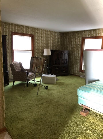 990 West Pines Road Oregon, IL 61061 - Photo 10 of 24 a living room with a couch and a table