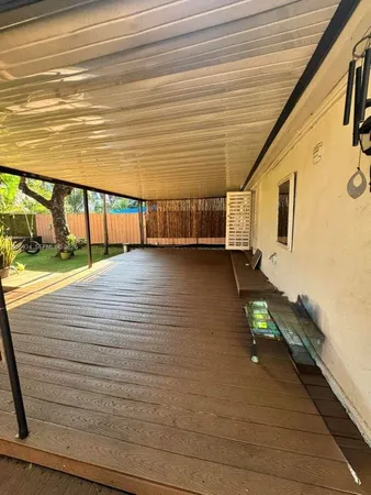 a view of a balcony with an outdoor space