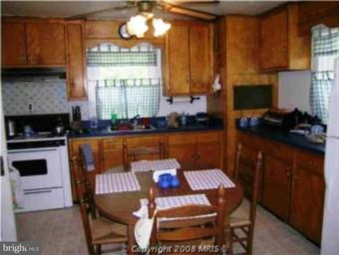 22181 St Louis Road Middleburg, VA 20117 - Photo 5 of 10 Eat-in kitchen with entrance to laundry room and